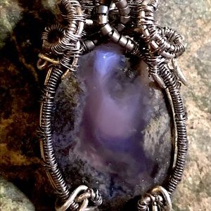 Wire wrapped purple moss agate
